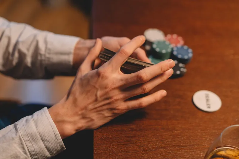 When Your Own Legend Works Against You: Escaping the Reputation Trap at the Rummy Table